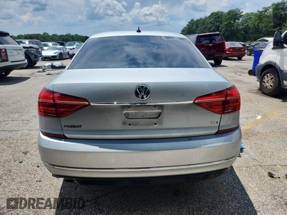 2016 Volkswagen Passat S z VIN 1VWAS7A32GC058844, wystawiony jako Copart lot #63416785 z przebiegiem 104 050 mil mil oraz Szkoda całkowita • Salvage title. Historia ofert i sprzedaży dostępna na DreamBid. Obrazek 6.