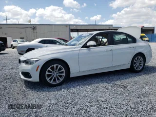 2018 BMW 3 Series 320i z VIN WBA8E1G55JNU88942, wystawiony jako Copart lot #51738745 z przebiegiem Nie podano mil oraz Szkody całkowita. Historia ofert i sprzedaży dostępna na DreamBid. Obrazek 1.