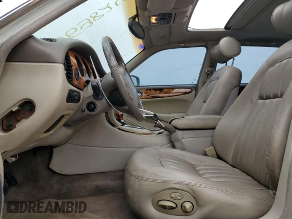 1998 Jaguar XJ with VIN SAJHX1248WC835728, listed as a Copart auction lot 86698244 with 116,768 mi miles and Clean title. Bid and sale history available at DreamBid. Image 7.
