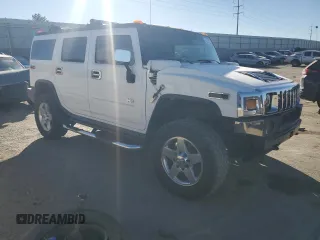 2004 Hummer H2 with VIN 5GRGN23U64H121213, listed as a Copart auction lot 42001135 with 0 mi miles and Salvage Title. Bid and sale history available at carsss.com. Image 4.