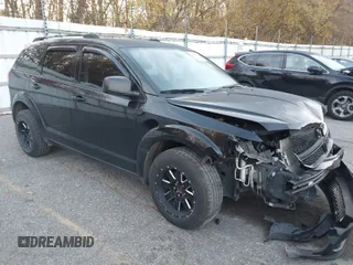 2018 Dodge Journey SE with VIN 3C4PDCAB8JT295146, listed as a IAAI auction lot 40641374 with 112,206 mi miles. Bid and sale history available at carsss.com. Image 1.