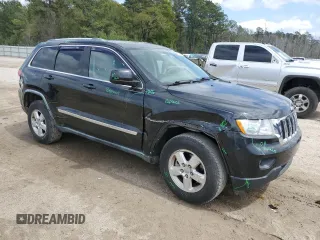 2011 Jeep Grand Cherokee Laredo with VIN 1J4RS4GG4BC537459, listed as a Copart auction lot 50920965 with 112,810 mi miles and Salvage Title. Bid and sale history available at DreamBid. Image 4.