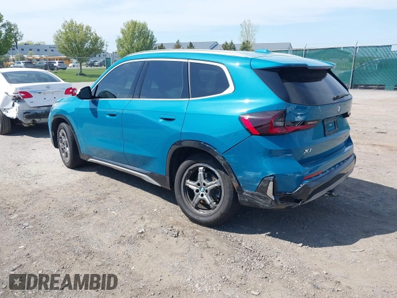 2023 BMW X1 xDrive28i with VIN WBX73EF00P5W52935, listed as a IAAI auction lot 42221084 with 16,394 mi miles and . Bid and sale history available at DreamBid. Image 3.