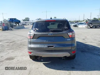 2018 Ford Escape Titanium with VIN 1FMCU0J98JUA03474, listed as a IAAI auction lot 37677880 with 106,423 mi miles and . Bid and sale history available at DreamBid. Image 16.