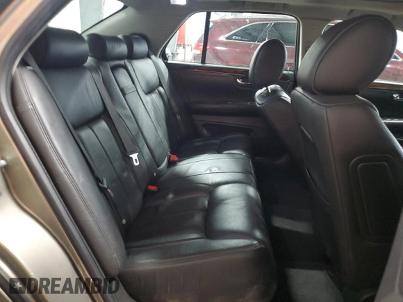 2011 Cadillac DTS Premium Collection z VIN 1G6KH5E68BU143689, wystawiony jako Copart lot #51861855 z przebiegiem 124 522 mil mil oraz Szkoda całkowita • Salvage title. Historia ofert i sprzedaży dostępna na DreamBid. Obrazek 10.