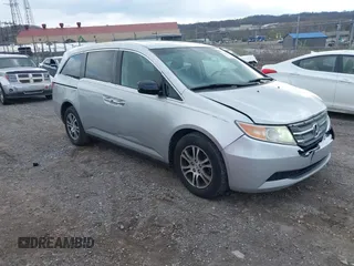 2011 Honda Odyssey EX-L with VIN 5FNRL5H60BB012206, listed as a IAAI auction lot 41982987 with 220,913 mi miles and . Bid and sale history available at carsss.com. Image 1.