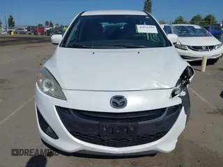 2012 Mazda 5 Touring with VIN JM1CW2CL7C0140452, listed as a IAAI auction lot 41970209 with 92,069 mi miles and . Bid and sale history available at DreamBid. Image 13.