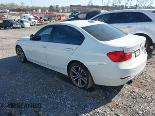 2013 BMW 3 Series 328i xDrive with VIN WBA3B5G59DNP40559, listed as a IAAI auction lot 41664963 with 97,103 mi miles. Bid and sale history available at carsss.com. Image 3.