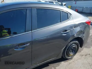 2016 Mazda Mazda3 i Grand Touring with VIN JM1BM1X79G1278079, listed as a IAAI auction lot 42010729 with 104,797 mi miles. Bid and sale history available at carsss.com. Image 6.