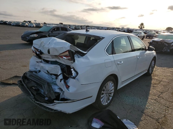 2016 Volkswagen Passat SE с VIN 1VWBT7A37GC020690, выставлен на аукционе Copart как лот 65091314 с пробегом 89 027 миль миль и Списание • Salvage title. История ставок и продаж доступна на DreamBid. Изображение 3.