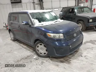 2008 Scion xB with VIN JTLKE50E281031232, listed as a IAAI auction lot 41591536 with 177,636 mi miles. Bid and sale history available at carsss.com. Image 1.