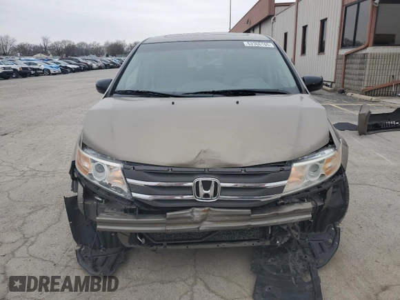 2012 Honda Odyssey Touring with VIN 5FNRL5H9XCB078399, listed as a Copart auction lot 52360165 with 174,819 mi miles and Salvage Title. Bid and sale history available at DreamBid. Image 5.