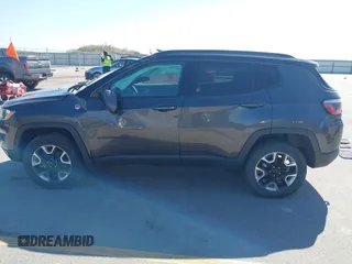 2019 Jeep Compass Trailhawk with VIN 3C4NJDDB0KT619337, listed as a IAAI auction lot 42171160 with 63,869 mi miles and . Bid and sale history available at DreamBid. Image 14.