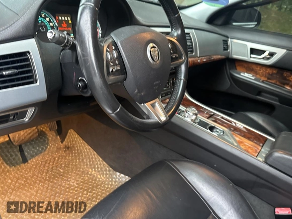 2013 Jaguar XF I4 RWD with VIN SAJWA0ES8DPS97356, listed as a Copart auction lot 74621874 with 123,970 mi miles and Clean Title. Bid and sale history available at carsss.com. Image 9.