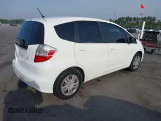 2010 Honda Fit with VIN JHMGE8H22AS022221, listed as a IAAI auction lot 42009796 with 101,904 mi miles. Bid and sale history available at carsss.com. Image 4.