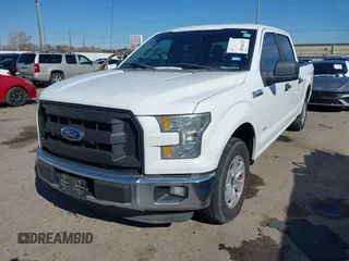 2015 Ford F-150 XL with VIN 1FTEW1CG5FFA61157, listed as a IAAI auction lot 41299436 with 145,310 mi miles. Bid and sale history available at carsss.com. Image 2.