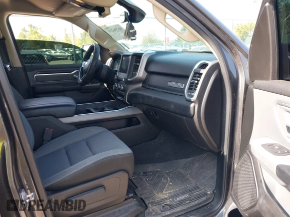 2019 Ram 1500 Big Horn/Lone Star with VIN 1C6RRFFG7KN817399, listed as a IAAI auction lot 40296231 with 63,708 mi miles. Bid and sale history available at carsss.com. Image 5.
