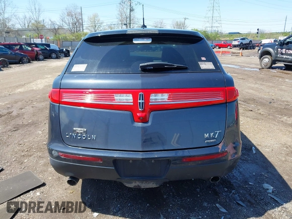 2014 Lincoln MKT EcoBoost z VIN 2LMHJ5ATXEBL57360, wystawiony jako IAAI lot #41976182 z przebiegiem 126 676 mil mil oraz . Historia ofert i sprzedaży dostępna na DreamBid. Obrazek 17.