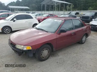 1997 Mitsubishi Mirage DE z VIN JA3AY26AXVU007285, wystawiony jako Copart lot #71958454 z przebiegiem 156 415 mil mil oraz Szkoda całkowita • Salvage title. Historia ofert i sprzedaży dostępna na DreamBid. Obrazek 1.