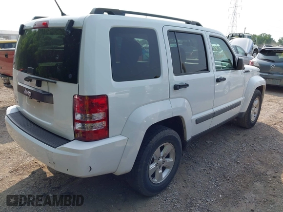 2012 Jeep Liberty Sport with VIN 1C4PJMAK7CW151132, listed as a IAAI auction lot 42418592 with 203,200 mi miles and . Bid and sale history available at DreamBid. Image 4.