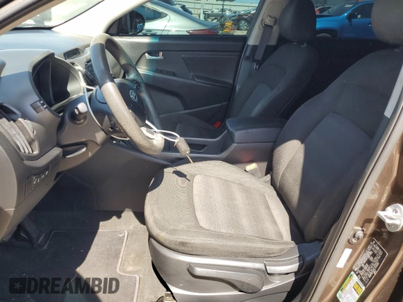 2012 Kia Sportage LX with VIN KNDPBCA20C7214959, listed as a Copart auction lot 62730645 with 194,768 mi miles and Clean title. Bid and sale history available at DreamBid. Image 7.