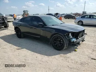 2015 Dodge Charger SXT with VIN 2C3CDXHG7FH721825, listed as a Copart auction lot 58076255 with 193,740 mi miles and Salvage title. Bid and sale history available at DreamBid. Image 14.