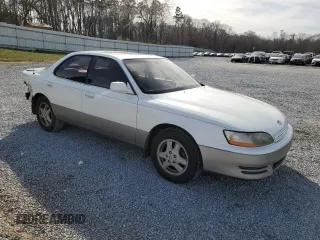 1995 Lexus ES 300 with VIN JT8GK13T8S0107061, listed as a Copart auction lot 49986875 with 306,343 mi miles and Salvage Title. Bid and sale history available at DreamBid. Image 4.