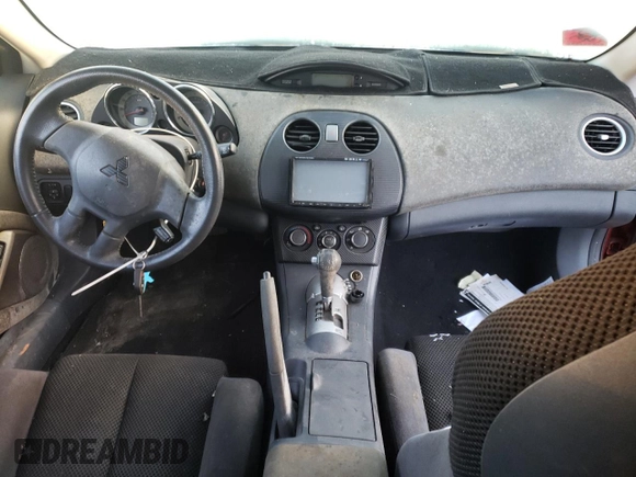 2006 Mitsubishi Eclipse GS z VIN 4A3AK24F96E010821, wystawiony jako Copart lot #70957064 z przebiegiem Nie podano mil oraz Nie do naprawy • Non repairable. Historia ofert i sprzedaży dostępna na DreamBid. Obrazek 8.