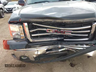 2012 GMC Sierra 1500 SLT z VIN 1GTR2WE71CZ337710, wystawiony jako IAAI lot #40658228 z przebiegiem 105 781 mil mil oraz . Historia ofert i sprzedaży dostępna na DreamBid. Obrazek 6.