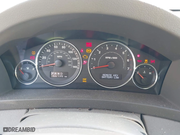 2009 Jeep Grand Cherokee Laredo with VIN 1J8GS48K79C516320, listed as a IAAI auction lot 41353131 with 166,739 mi miles. Bid and sale history available at carsss.com. Image 7.