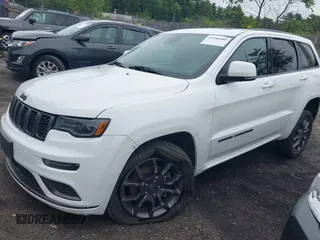 2021 Jeep Grand Cherokee High Altitude with VIN 1C4RJFCG0MC729006, listed as a IAAI auction lot 42486088 with 76,287 mi miles and . Bid and sale history available at DreamBid. Image 2.