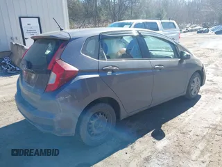 2018 Honda Fit LX z VIN 3HGGK5G44JM716592, wystawiony jako IAAI lot #41878820 z przebiegiem 70 464 mil mil oraz . Historia ofert i sprzedaży dostępna na DreamBid. Obrazek 4.