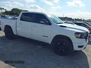 2021 Ram 1500 Lone Star with VIN 1C6RREFT1MN749997, listed as a IAAI auction lot 41306635 with 59,451 mi miles and . Bid and sale history available at DreamBid. Image 1.