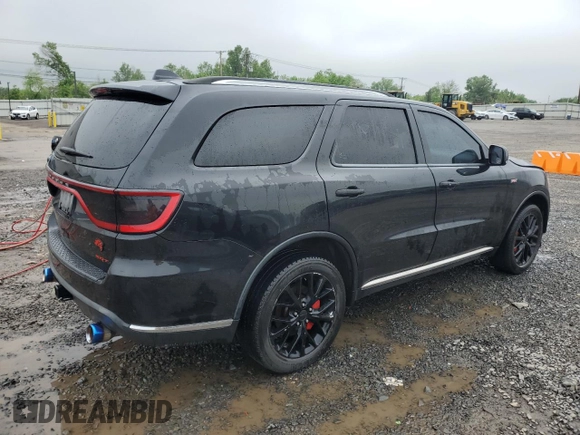 2014 Dodge Durango Citadel с VIN 1C4SDJET3EC361282, выставлен на аукционе Copart как лот 56781505 с пробегом 163 641 миль миль и Списание • Salvage title. История ставок и продаж доступна на DreamBid. Изображение 3.