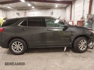 2019 Chevrolet Equinox LT with VIN 2GNAXKEV1K6157781, listed as a IAAI auction lot 41274846 with 128,425 mi miles and . Bid and sale history available at DreamBid. Image 13.
