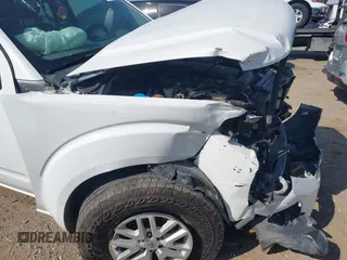 2015 Nissan Frontier S with VIN 1N6AD0EV3FN740597, listed as a IAAI auction lot 42257170 with 171,582 mi miles and . Bid and sale history available at DreamBid. Image 6.