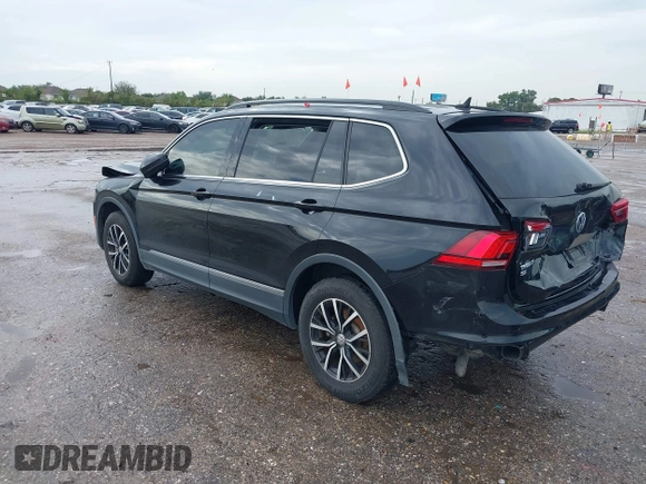 2021 Volkswagen Tiguan SE z VIN 3VV3B7AX7MM004286, wystawiony jako IAAI lot #39864219 z przebiegiem 67 429 mil mil oraz . Historia ofert i sprzedaży dostępna na DreamBid. Obrazek 3.