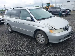 2003 Honda Odyssey EX-L z VIN 5FNRL18033B042810, wystawiony jako IAAI lot #42229495 z przebiegiem 231 682 mil mil oraz . Historia ofert i sprzedaży dostępna na DreamBid. Obrazek 1.