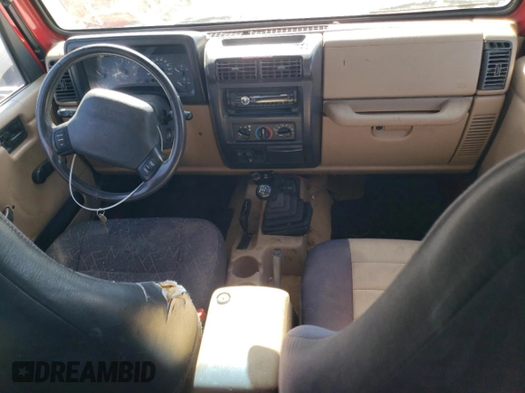 2000 Jeep Wrangler Sport with VIN 1J4FA49S1YP703560, listed as a Copart auction lot 73647844 with 117,300 mi miles and Salvage Title. Bid and sale history available at carsss.com. Image 8.