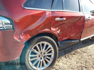 2014 Lincoln MKX with VIN 2LMDJ8JK2EBL00416, listed as a IAAI auction lot 40693429 with 118,427 mi miles. Bid and sale history available at carsss.com. Image 6.
