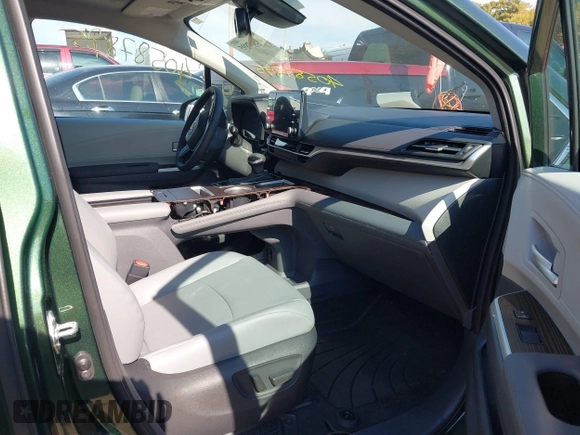 2024 Toyota Sienna XLE with VIN 5TDJSKFC2RS147426, listed as a IAAI auction lot 40587895 with 2,143 mi miles and . Bid and sale history available at DreamBid. Image 5.