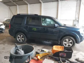 2011 Honda Pilot EX-L with VIN 5FNYF4H66BB020176, listed as a IAAI auction lot 41973659 with 238,745 mi miles and . Bid and sale history available at carsss.com. Image 13.
