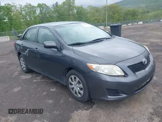 2009 Toyota Corolla with VIN JTDBL40E999048446, listed as a IAAI auction lot 42210822 with 260,005 mi miles. Bid and sale history available at carsss.com. Image 1.
