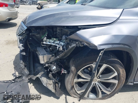 2016 Lexus RX 450h z VIN 2T2BGMCAXGC005914, wystawiony jako IAAI lot #42156530 z przebiegiem 94 050 mil mil oraz . Historia ofert i sprzedaży dostępna na DreamBid. Obrazek 6.