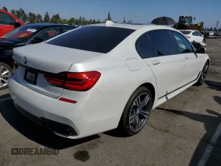 2018 BMW 7 Series 740i with VIN WBA7E2C5XJB214886, listed as a Copart auction lot 57833143 with 39,975 mi miles. Bid and sale history available at carsss.com. Image 3.