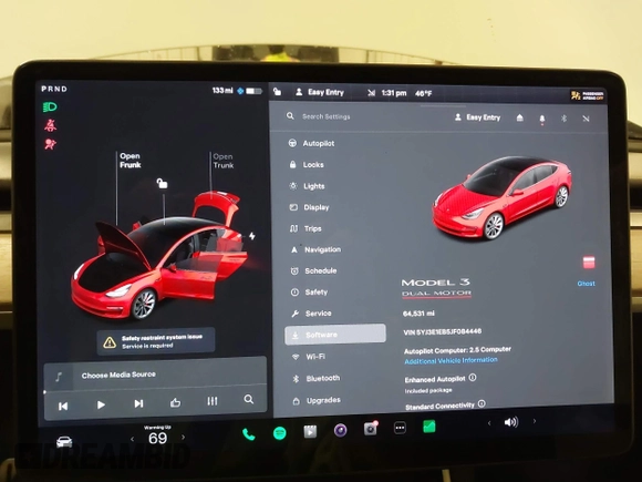 2018 Tesla Model 3 Long Range Battery with VIN 5YJ3E1EB5JF084446, listed as a IAAI auction lot 41209852 with 70,125 mi miles and . Bid and sale history available at DreamBid. Image 7.
