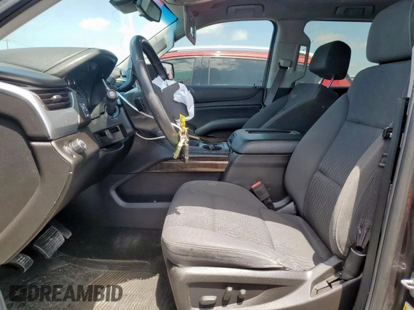2016 Chevrolet Tahoe LS with VIN 1GNSCAKC4GR458621, listed as a Copart auction lot 59531215 with 143,346 mi miles and Salvage title. Bid and sale history available at DreamBid. Image 7.