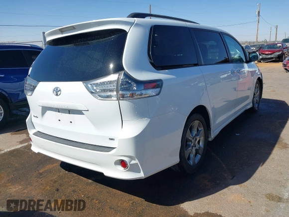 2014 Toyota Sienna SE with VIN 5TDXK3DC1ES417081, listed as a IAAI auction lot 41850444 with 173,545 mi miles. Bid and sale history available at carsss.com. Image 4.
