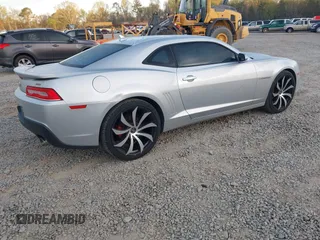 2014 Chevrolet Camaro LT z VIN 2G1FC1E36E9259754, wystawiony jako IAAI lot #41864556 z przebiegiem 118 443 mil mil oraz . Historia ofert i sprzedaży dostępna na DreamBid. Obrazek 4.