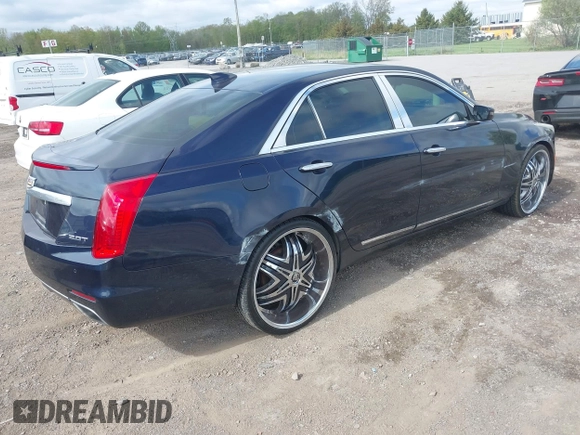 2015 Cadillac CTS Luxury AWD with VIN 1G6AX5SX5F0119102, listed as a IAAI auction lot 42231015 with 106,643 mi miles and . Bid and sale history available at DreamBid. Image 4.